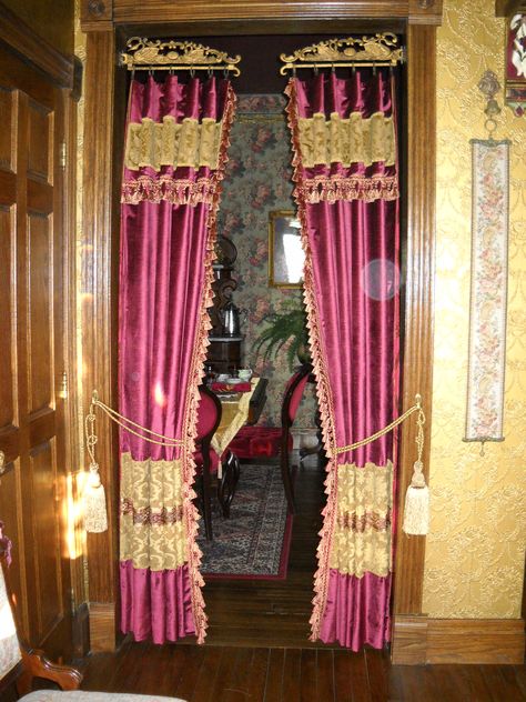 Victorian portieres on antique swinging rods Curtains In Victorian House, Victorian Drapes, Victorian Curtain Rods, Victorian Curtains, Victorian Boho, Gothic Bedroom Curtains & Drapes, Princess Room Curtains & Drapes, Curtains Pictures, Victorian Room