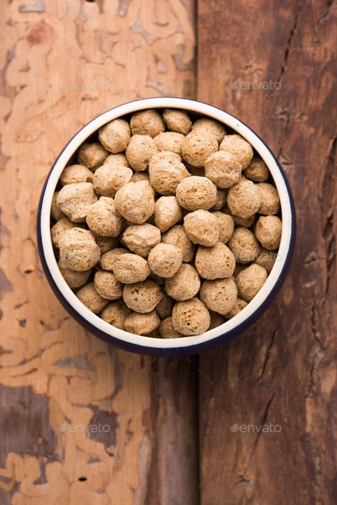 Soya Chunks by stockimagefactory. Raw Soya Chunks, Soy Meat for vegans isolated on colourful background in a bowl or in heap form #Sponsored #Raw, #Soy, #Meat, #Soya Soy Meat, Soya Chunks, Colourful Background, A Bowl, Dog Food Recipes, Food Animals, Nail Care, Nutrition, Diet