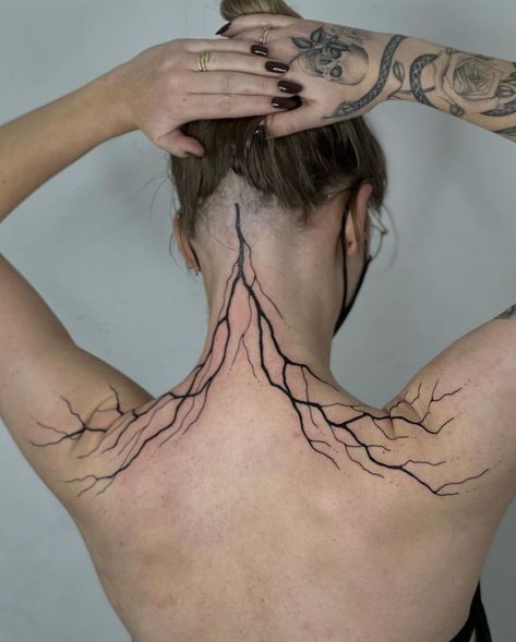 Lightning Bolt Tattoo Back, Lightning Wings Tattoo, Asian Lightning Tattoo, Heart And Lightning Bolt Tattoo, Thunder Tattoo Women, Neck Tattoo Lightning, Lightning Bolt Spine Tattoo, Lightning Collarbone Tattoo, Abstract Spine Tattoos For Women