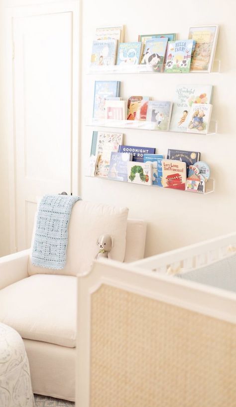 Books In Nursery Ideas, Book Area Nursery, Nursery Book Shelf Wall Ideas, Acrylic Book Shelves In Nursery, Baby Bookshelf Ideas, Serena And Lily Nursery Girl, Coastal Grandmother Nursery, Nursery Wall Bookshelves, Classic Baby Nursery