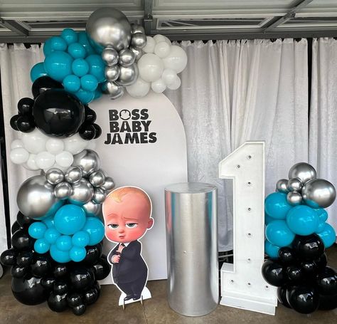 Boss Baby-themed party backdrop with character standee and balloon decorations Boss Baby Birthday Backdrop, Boss Baby Decoration, Boss Baby Theme Party Decorations, Baby Boss Decoration Ideas, Boss Baby Birthday Theme, Boss Baby Birthday Party Boy, Baby Birthday Party Ideas, Boss Baby Birthday Party, Baby Birthday Backdrop