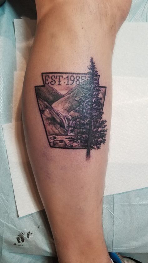 Keystone symbol with waterfall and mountains with a tree.  Pennsylvania Proud Keystone Tattoo Pennsylvania, Pennsylvania Tattoo Ideas, Keystone Tattoo, Pennsylvania Tattoo, Military Sleeve Tattoo, Safety Pin Tattoo, Symbol Tattoos With Meaning, Brand New Tattoos, Key Tattoo