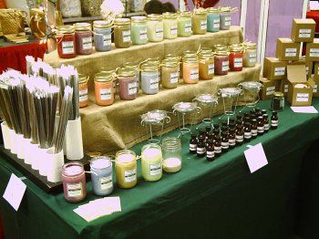 How to Set Up Candle Craft Displays · Candle Making | CraftGossip.com Candle Booth, Craft Displays, Vendor Booth Display, Craft Fair Booth Display, Stall Display, Hand Dipped Candles, Candle Display, Soap Display, Spring Fair