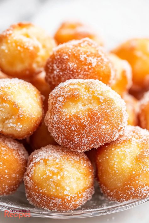 Easy Zeppole (Italian Donuts) Recipe - EasyWorldRecipes Easy Yeast Doughnut Recipe, Baked Cream Filled Donut Recipes, Old Fashioned Glazed Donut Recipe, Quick Donut Holes, Olive Garden Donuts Recipe, Bombolini Donut Recipe, Perfiteroles Recipe, Mexican Donuts Recipe, Doughnut Holes Recipe Easy