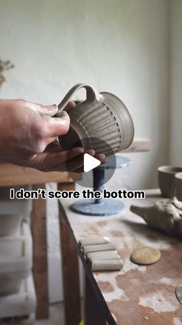 Chris Penny Ceramics on Instagram: "Part 3: fluted cups, I don’t score the bottom attachment point for the handles that I pull, I haven’t found it to be necessary, and it’s another area that would need to be cleaned up. Also the handle is quite wet at this stage. So it’s making it own slip. 😬
I do score the top. 
I then leave the cup’s upside down (to keep the attitude of the handles positive… happy handles make for happy cups). I put them in a damp box to slow down the drying, if they dry out too quickly the handles WILL crack! 3 or 4 days later I take them out… come back in 3 or 4 days to find out what happens next…dun dun dah 
#cliffhanger #pottery #ceramics #maker #craft #handmadecup" Clay Handles, Pottery Handles Ideas, Pottery Handles How To, Making Handles For Pottery, Making Ceramic Handles, Happy Cup, Handmade Cups, Cup Handles, Pottery Cups