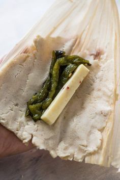 A Mexican classic, these Green Chile and Cheese Vegetarian Tamales are filled with roasted poblano peppers and spicy pepper jack cheese. Also gluten free! #tamalesmexican Chili And Cheese Tamales, Green Chili And Cheese Tamales, Cheese Tamales Recipe, Cheese Tamales, Homemade Tamales Recipe, Vegetarian Tamales, Tamales Recipe, Homemade Tamales, Authentic Mexican Recipes