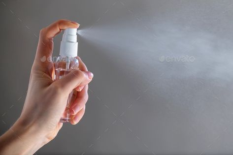 Girl applying spray disinfectant alcohol product on hand by byrdyak. Female person woman or girl applying spray disinfectant alcohol product on hand disinfecting hands against virus bact... #AD #product, #alcohol, #byrdyak, #hand Minimalist Skincare, Blog Designs, Disaster Preparedness, Acne Blemishes, Ask For Help, Fashion Website, Website Templates, Keep On, Natural Disasters