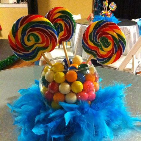 Candy centerpiece without the feathers maybe :) Candy Centerpiece, Candy Theme Birthday Party, Candy Centerpieces, Candy Birthday Party, Yellow Feathers, Candyland Party, Cat Birthday Party, Candy Theme, Carnival Birthday Parties