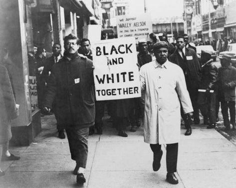 "We Support Wally Nelson - in jail on a trumped up charge," and "Black and White Together," ca. 1965 -- Wally Nelson was an American civil rights activist and war tax resister. He spent three and a half years in prison as a conscientious objector during World War II, he was on the first of the “freedom rides” that sought to enforce desegregation in 1947, and he was the first national field organizer for the Congress of Racial Equality.  Photo credit: MPI / Getty Images Black Lives Matter Art, Racial Equality, History Quotes, Power To The People, Civil Rights Movement, Top Memes, Visual Statements, White People, African American History