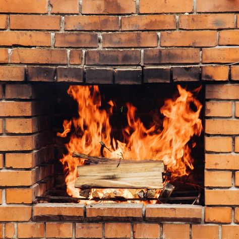 How To Clean Fireplace, Fireplace Cleaner, Ground Level Deck, Fireplace Brick, Platform Deck, How To Clean Brick, Interior Brick, Clean Fireplace, The Family Handyman