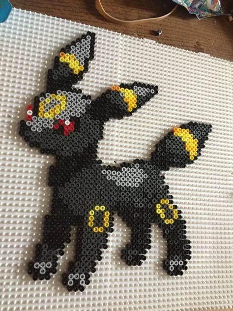 Umbreon perlers beads Perler Bead Umbreon, Umbreon Perler Bead Pattern, Umbreon Perler Beads, Umbreon Perler, Pokémon Perler Beads, Perler Bead Pokemon Patterns, Hama Beads Pokemon, Melty Bead Designs, Pokemon Perler