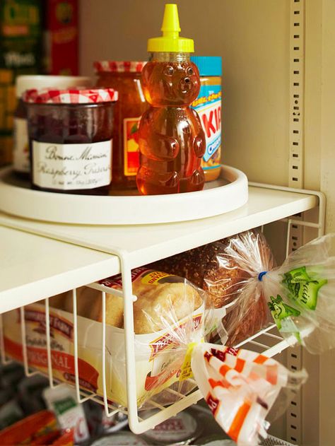 A lazy Susan makes it easy to find condiments that otherwise get pushed to the back of the pantry. More simple storage solutions: http://www.bhg.com/decorating/storage/organization-basics/simple-storage-for-less/?socsrc=bhgpin060213lazysusan=3 Organize Pantry, Diy Pantry Organization, Easy Hacks, Diy Pantry, Bread Storage, Kitchen Organization Pantry, Diy Kitchen Storage, Kitchen Cabinet Organization, Diy Kitchen Cabinets