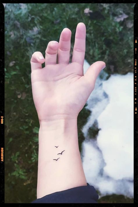 Tattoos Tatoos Wrist Women, Mini Bird Tattoos For Women, Danty Tattoos Women Wrist, Bird Memorial Tattoos For Women, Tattoo For The Wrist, 2 Birds Flying Tattoo, Small Simple Wrist Tattoos, Small Bird Wrist Tattoo, Mens Wrist Tattoos Ideas