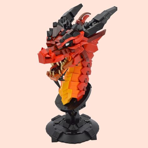 In designer Wes Talbott's rainbow parade of LEGO dragons, Red marches into view. Kartu Pokemon, Lego Dragon, Lego Sculptures, Lego Display, Lego Animals, Amazing Lego Creations, Lego Craft, Lego Creative, Lego Pictures