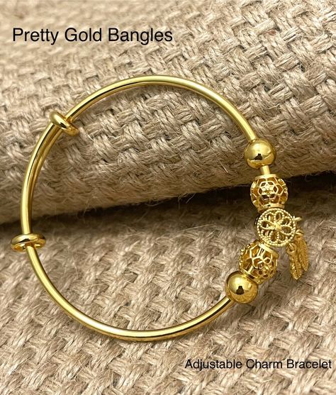 Buy Gold Charm Bangle Charm Bracelet for Women Charm Jewelry online on Etsy India. Shop for handmade, vintage and unique Bangles items from PrettyGoldBangles online on Etsy Unique Bangle, Handmade Gold Jewellery, Bangles For Women, Gold Jewelry Stores, Jewelry Bracelets Gold, Bangles Making, The Bangles, Dope Jewelry, Handmade Bangles