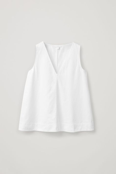 SLEEVELESS A-LINE TOP WITH V-NECK - White - Tops - COS Cotton Linen Trousers, Linen Top Women, White Kurta, Cotton Linen Pants, Fashion Tops Blouse, Cut Sweatshirts, Fashion Design Clothes, Linen Top, Linen Clothes