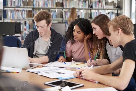 Group Of College Students Collaborating On Project In Library photo by monkeybusiness on Envato Elements Student Photoshoot, Education Aesthetic, College Image, Going Back To College, Public High School, Group Project, College Aesthetic, Studying Abroad, Flipped Classroom