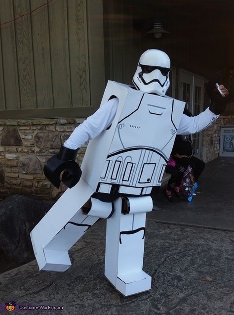 My husband made this LEGO Star Wars first order storm trooper costumes from cardboard and poster bord. Only store bought item is his helmet. Photo 2 of 3. Diy Storm Trooper Costume, Storm Trooper Costume Kids, Stormtrooper Costume, Star Wars First Order, Storm Trooper Costume, Lego Stormtrooper, Cardboard Costume, Lego Costume, Star Wars Theme Party