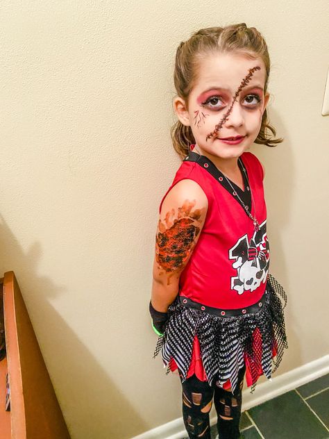 Halloween makeup kid zombie cheerleader Diy Zombie Cheerleader Costume, Scary Cheerleader Makeup, Zombie Cheerleader Makeup For Kids, Halloween Cheerleader Makeup, Dead Cheerleader Makeup, Zombie Cheerleader Makeup, Cheerleader Makeup, Kids Zombie Makeup, Halloween Zombie Makeup