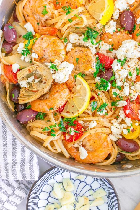 Get ready to indulge in this scrumptious Mediterranean shrimp pasta that’s bursting with flavor. This Italian-inspired dish features succulent shrimp, flavorful Kalamata olives, tangy marinated artichokes, garlic, plus a zesty kick from the lemon. The addition of white wine adds a wonderful depth, while the cherry tomatoes and capers bring a refreshing brightness to each bite. If you’re a fan of those delicious Mediterranean ingredients, you’re in for a treat with this seafood linguine dish. Mediterranean Shrimp Pasta, Mediterranean Ingredients, Shrimp Linguine Recipe, Mediterranean Shrimp, Marinated Artichokes, Seafood Linguine, Shrimp Linguine, Linguine Recipes, Juicy Shrimp