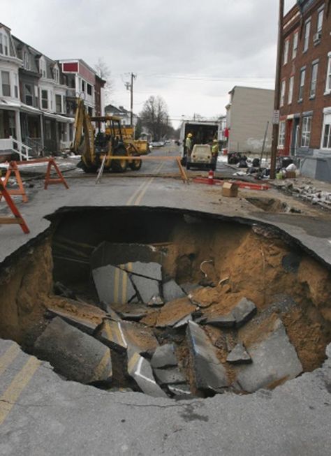 Bankrupt Harrisburg, PA, can't fix the 41 sinkholes plaguing its streets. Locals took to calling the North Fourth sinkhole "Super Sinkhole Walter," and even made it a "check in" location on Four Square.  Photos by Gilliland/ The Patriot-News Wild Weather, State Capital, Harrisburg Pa, Square Photos, Natural Phenomena, Street Photo, Extreme Weather, Check In, Natural Disasters