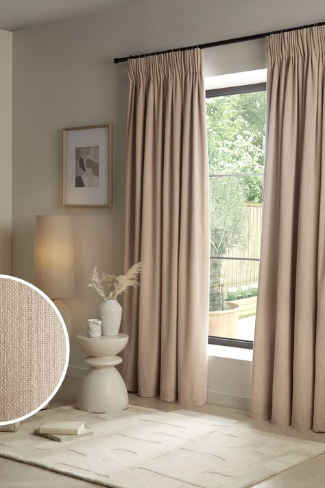 Breathe new life into your room with these linen-look curtains. The blackout thermal lining has all the benefits of blackout but with an additional coating providing thermal properties, is ideal for all seasons. The 6” pencil pleat header has small, neat folds at the top of the curtain creating a beautiful drape. Pencil pleat curtains can be hung on a track using hooks, or on a pole using hooks and rings (hooks/rings not included). Dry clean only. 2 x Curtains Main 60% Recycled polyester, 35% Polyester, 5% Linen. Lining 100% Recycled polyester with acrylic backing. Oak Furniture Bedroom Curtains, Long Beige Curtains Living Room, Bedroom Decor With Curtains, Curtain Ideas For Bedroom Aesthetic, Nude Curtains Living Room, Beige Curtains Bedroom Ideas, Floor Length Curtains Living Room, Neutral Bedroom Curtains Ideas, Natural Curtains Living Room