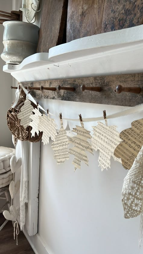 My leaf banner is made with antique hymns. I love the patina on the pages from it being so old. Each leaf  will be different as I go through the book and cut out the leaves for your banner :) Strung on an ivory ribbon twine. I include 7 brown clothes pins for hanging  Each leaf is anywhere between 6.5"x 8" or so  There are  3 of one leaf and 2 each of the other two No other accessories included Book Page Banner, Picnic Fall, Fall Burlap Banner, Leaf Banner, Autumn Window Display, Craft Thanksgiving, Halloween Chalkboard, Brown Clothes, Fall Family Fun