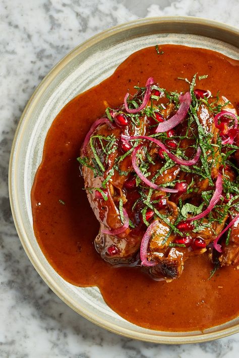 A stunning centrepiece, this slow-cooked Indian leg of lamb is meltingly tender and served in a sticky, glossy, rich and slightly tangy sauce. With a raita on the side made from whipped goat's curd, it's the perfect showstopper for a Sunday dinner with a difference. Serve with rice, flatbreads and other Indian side dishes for a full-blown feast. Easter Lamb Recipe, Lamb Leg Recipes, Indian Side Dishes, Roast Lamb Leg, Marinated Lamb, Great British Chefs, Leg Of Lamb, Lamb Dishes, Lamb Roast