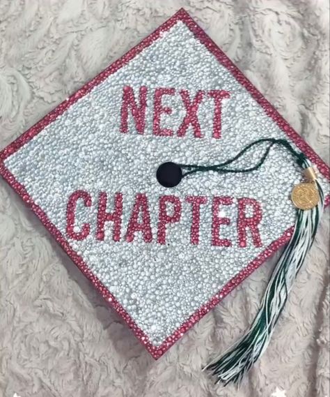 pink and Silver graduation cap completely rhinestones. Says “Next Chapter” Graduation Cap Designs Class Of 2023, Graduation Cap Designs 23, Grad Cap Ideas Middle School, Cap Decoration Graduation Rhinestones, Pink Rhinestone Grad Cap, Rhinestone Graduation Cap Ideas, Graudtion Caps Ideas 2023, Beauty School Cap Ideas, Cute Girly Graduation Cap