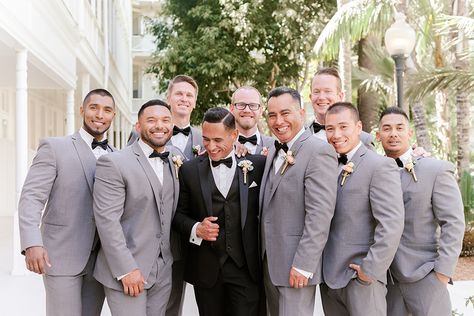 groomsmen Black Tux Groom, Dark Grey Groomsmen, Cruiseport Gloucester, Bridal Party Color Schemes, Groom Suit Black, Gray Groomsmen Suits, San Diego Beach Wedding, Beach Wedding Groom, Bridal Parties Colors