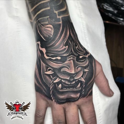 Dope hand piece from Ben Carlisle made using #magnumtattoosupplies 👊🏻 . . #blackandgrey #tattoo #blackandgreytattoo #tattoos #ink #inked #tattooartist #art #tattooart #tattooed #tattoolife #realistictattoo #blackwork #realism #artist #tattooideas Instagram: ben_carlisle_tattooist 👈🏻 Japanese Style Hand Tattoo, Hand Mask Tattoo, Japan Hand Tattoo, Hand Tattoos For Men Ideas Design, Chinese Hand Tattoos, Oni Mask Hand Tattoo, Samurai Hand Tattoo, Devil Hand Tattoo, Cover Up Hand Tattoos