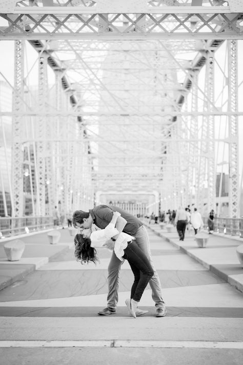 Couple on the pedestrian bridge for their Downtown Nashville engagement photos. Engagement pictures inspiration for city and downtown sessions!   #engagementpictures #nashvillephotographer #nashvilleweddingphotographer #downtownnashville #engagementphotos Nashville Pedestrian Bridge Pictures, Nashville Couples Photos, Nashville Engagement Photos Downtown, Engagement Photos Nashville, Anniversary Ideas Couple, Couple Things To Buy, Nashville Pics, Nashville Engagement Photos, Nashville Photos