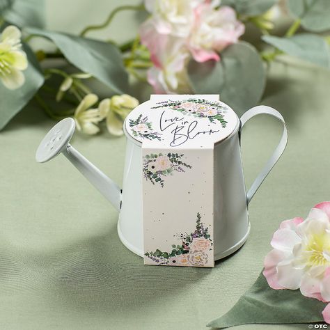 Love in Bloom Mini Watering Can Cardstock Wrap - 12 Pc. | Oriental Trading Floral Bridal Shower Favors, Love In Bloom Centerpieces, Baby In Bloom Shower Favors, Love In Bloom Bridal Shower Theme Decor, Baby In Bloom Favors, Baby In Bloom Party Favors, Adult Garden Party, Garden Theme Bridal Shower Ideas, Love Is In Bloom Bridal Shower Theme