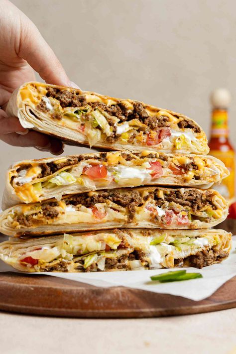 Recreate Taco Bell's iconic Crunchwrap Supreme at home—it's incredibly easy and arguably better than the drive-thru version. Turkey Supreme, Taco Bells, Chipotle Sofritas, Taco Bell Crunchwrap Supreme, Taco Bell Crunchwrap, Crunchwrap Supreme, Starbucks Egg Bites, Protein Nutrition, Restaurant Dishes