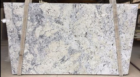 White Ice - A white and creamy background stone with rich blue & gray veining Blue Gray Granite Countertops, White Granite With Blue Veins, White And Blue Countertops, Ice Blue Granite Countertops, Granite Kitchen Countertops Colors, White Ice Granite Countertops, Bbq Counter, Moon White Granite, Light Colored Granite