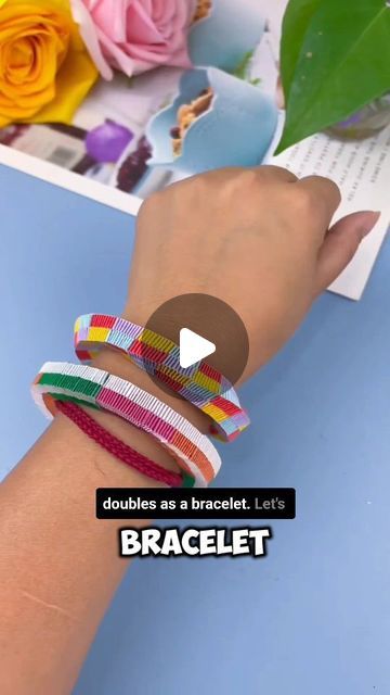 Paper Craft Ideas on Instagram: "Join us in making a fun decompressor tie that can also be used as a bracelet! Using four different color paper strips, we start by placing them parallel and alternating the colors to create a checkboard pattern. Watch as we weave the strips together, ensuring they are long enough to wrap around the waist. We then fold the ends into a wheel to square them and connect the ends to tighten the shape evenly throughout. This creative project is a fantastic way to relax and make a versatile accessory. Follow along and enjoy this fun and engaging craft!" Paper Strips Crafts, Paper Strip Crafts, Checkboard Pattern, Craft Watch, Art Camp Projects, Bracelet Paper, Paper Bracelet, Paper Folding Crafts, Weaving For Kids