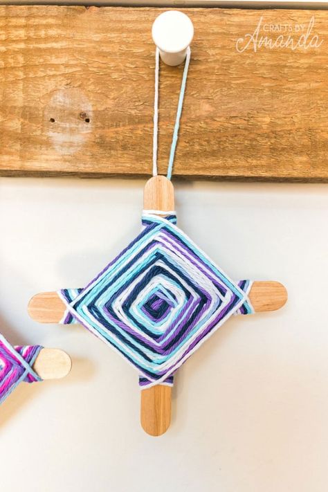 This God's eye craft is the perfect camp craft for kids. They'll enjoy choosing their yarn colors and making their own God's eye they can proudly display! God's Eye Craft, God's Eye, Camp Crafts, Dream Catcher Craft, Gods Eye, Grand Kids, Summer Program, Elephant Pattern, Eye Tutorial