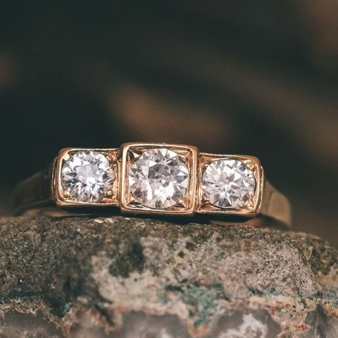 LOST OWL on Instagram: "Cool 1930s Art Deco trilogy ring with three bright old European cut diamonds in square stepped settings, the central stone set slightly higher than the other two. A hint of millegrain adorns the bezels, and the gallery features scrolled openwork to allow light in behind the stones. Crafted in 18ct gold, it's home to a combined diamond weight of 65pts. Shop the Etsy link in my bio or DM for direct pricing ✌ #artdecoring #threestonering #diamondring #vintageengagementring Art Deco Three Stone Ring, Om Symbol Art, Symbol Art, Trilogy Ring, Om Symbol, 1930s Art, Bezel Ring, Three Stone Ring, 1930s Art Deco