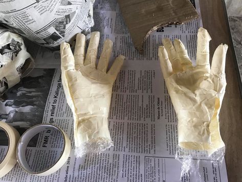 Here's a video that shows you how to make a cast (or mold) of your hands using cling wrap, masking tape, and newspaper. #DIY #KalingaDIYer #HandCast #Recycled Masking Tape Hand Halloween, Diy Adams Family Hand, Diy Hand Casting Mold, Diy Scary Halloween Hands, Paper Mache Hand Sculpture, Diy Hand Sculpture, Paper Mache Hands Diy, Diy Hand Mold, How To Make A Mold Of Your Hand