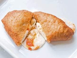 Fresh Tomato and Mozzarella Panzerotti | SAVEUR Panzerotti Recipe, Summer Tomato Recipe, Hot Pocket Recipes, Tomato And Mozzarella, Pizza Fritta, Fresh Tomato Recipes, Summer Tomato, Fresh Mozzarella, Tomato Recipes