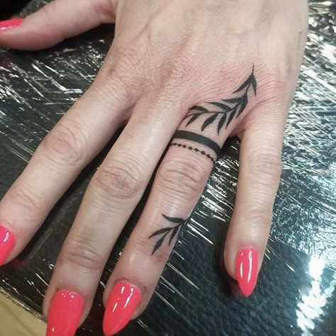 leaf wedding ring tattoo Women’s Ring Finger Tattoo, Wedding Ring Tattoos For Couples, Ring Tattoos For Couples, Wedding Ring Finger Tattoos, Wedding Ring Tattoos, Finger Tattoo Ideas, Finger Tattoos For Couples, Ring Tattoo Designs, Wedding Band Tattoo