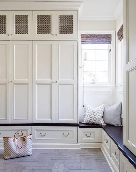 Built In Corner Bench, Mudroom Lockers With Doors, Lockers With Doors, Cottage Style Mudroom, Gray Herringbone Floor, Transitional Mudroom, Gray Marble Countertops, Transitional Laundry Room, Pink Laundry Rooms