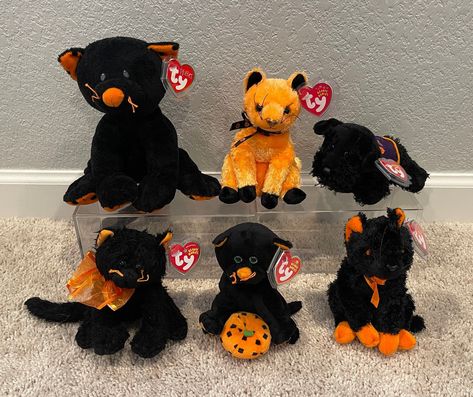 Your choice from the following Ty Beanie Babies Halloween themed cats and dogs. All items will come with tag protectors. - "Trickery" (Ty Pluffies - Large) (Cat) - "SCARD-e" (Cat) - "Tremble" (Dog) - "Moonlight" (Cat) - "Superstition" (Cat) - "Fraidy" (Cat) PLEASE NOTE - All items ship in BUBBLE MAILERS. If you prefer a box, please send a message with your order to secure a box. Halloween Plushies, Ty Pluffies, Cat Beanie Baby, Fraidy Cat, Halloween Plush, Blue Nose Friends, Original Beanie Babies, Halloween Cats, Beanie Buddies