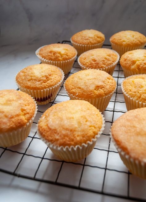 These zesty lemon drizzle cupcakes are absolutely divine - soft, tender sponge with a jam filling and a crunchy, sugary topping! #lemondrizzlecupcakes #lemondrizzlecupcakerecipe Lemon Drizzle Cupcakes, Fudge Ideas, 7up Cake Recipe, 7up Cake, Lemon Muffin Recipes, Sugar Free Eating, Lemon Cupcake Recipe, Mid Term, Lemon Sponge