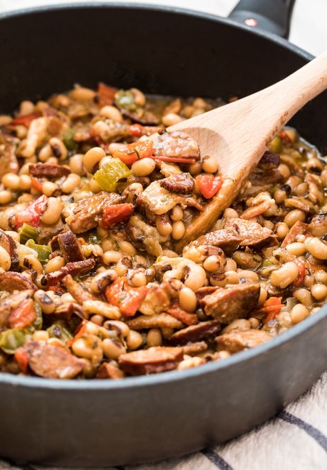 Authentic Hoppin’ John Recipe: This Black Eyed Pea Recipe is packed with zesty southern flavor! Serve "Peas and Rice" as a main dish or side #rice #southern #blackeyedpeas Hop And John Recipe, Best Hoppin John Recipe, Hopping John Soup Recipe, Hop N John Recipe, Hopping John Soup, Hoppin John Soup Recipe, Hoppin John Recipe With Sausage, Hoppin John Recipe Southern Style, Hopping John Recipe