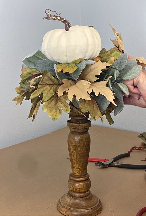 Pumpkin On A Candle Stick, Pumpkins On Candlesticks, Lantern Arrangements, Fall Candlesticks, Thanksgiving Luncheon, Pumpkin Candlesticks, Candlestick Arrangements, Fall Candle Centerpieces, Flower Money