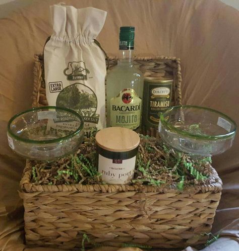 A Warm Bacardi Night!~A bag of pistachios, a bottle of Bacardi Mojito, tiramisu wafers rolls, 2 handmade Margarita glasses, Ruby port scented soy candle, and reusable lidded basket. ~Raffle gift for The Donovan Williams Memorial Foundation. Mojito Gift Basket Ideas, Liquor Baskets, Cocktail Gift Basket, Diy Liquor, Bacardi Mojito, Basket Raffle, Bottle Gift Wrapping, Caribbean Party, Silent Auction Baskets