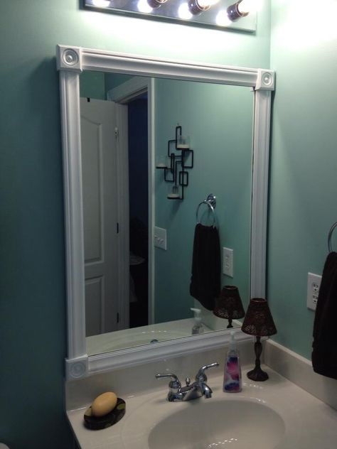 Framed bathroom mirror.    Cut molding and paint used to frame ugly bathroom mirrors.  It's not perfect but a HUGE improvement from builder basic. Ugly Bathroom, Bathroom Drawing, Cozy Cottage Kitchen, Mirror Drawings, Bathroom Mirror Frame, Cottage Kitchens, Bathroom Mirrors, Mirror Painting, Mirror Photo