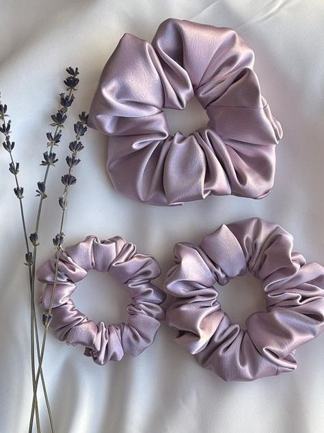 Lilac Satin scrunchies The cutest gift for the bride to be! Or a super thoughtful gift for your bridesmaids or a fun favor for your bachelorette party -Very Soft & comfortable -They are Gentle on the hair to prevent any creasing or breakage, frizz, ponytail bumps and split ends. - price is for one Ponytail Bump, Bridesmaid Scrunchie, Bachelorette Party Hair, Purple Scrunchie, Long Bridal Hair, Lavender Bridesmaid, Oversized Scrunchie, Diy Hair Scrunchies, Hair Tie Accessories