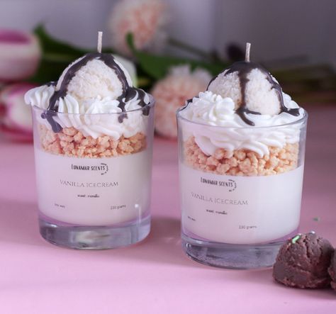 Elevate your space with our decadent Vanilla Dessert Candle! Hand-poured with precision, this luxurious 230g candle boasts layers of creamy white wax, tantalizing cookie crumbs, velvety whipped cream, and a delectable topping of vanilla ice cream drizzled with rich chocolate sauce. Enjoy the delightful aroma of vanilla wafting through your home as this candle burns for over 40 hours. Perfect for gifting to candle enthusiasts, dessert lovers, or anyone in need of a sweet-scented sanctuary. Gift S Christmas Dessert Candles, Desert Candles, Ice Cream Candle, Sundae Candles, Vanilla Dessert, Bougie Cupcake, Bakery Candles, Vanilla Cupcake Candle, Vanilla Desserts